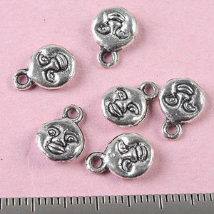 50pc Tibetan silver 2sided crafted smiled face charms h0710