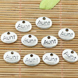 Assorted tibetan silver tone family lettering oval shaped charms to pick