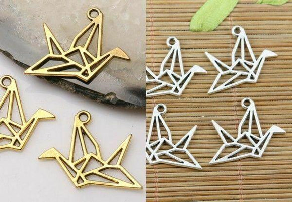 tibetan silver and dark gold color  origami  cranes design charms to Pick