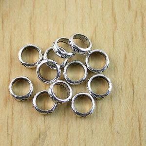 100pcs Tibetan silver xingdian ring links H1172