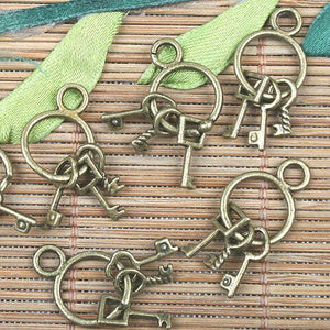 Alloy metal antiqued bronze color Keychains design charms 10pcs EF0146