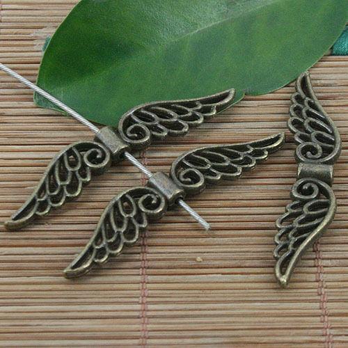 7pcs antiqued bronze 2sided hollow wing design spacer charms X0271