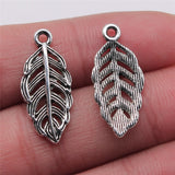 WYSIWYG 10pcs 11x25mm Feather Pendant Charms Antique Silver Color For Jewelry Making Zinc Alloy Jewelry Findings