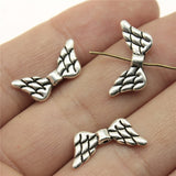 WYSIWYG 10pcs 19x9mm Angel Wing Small Hole Spacers Beads Charms DIY Wing Spacer Bead For Jewelry Making