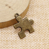 WYSIWYG 10pcs 23x20mm Puzzle Piece Charms For Jewelry Making Antique Bronze Color Charms Pendants Jewelry Accessories