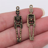 WYSIWYG 10pcs 39x9mm Charms Skull Skeleton Man 2 Colors Plated Pendants Making DIY Handmade Tibetan Finding Jewelry h1143