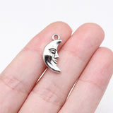 20 dijes de luna con cara de color plata antigua de 19 x 9 mm para hacer joyas