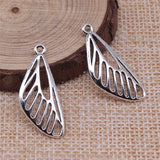 WYSIWYG 20pcs 29x12mm Antique Silver Color Hollow Butterfly Wings Charms Pendant For Jewelry Making DIY Jewelry Findings