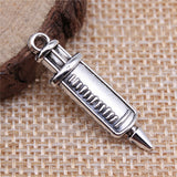 WYSIWYG 20pcs 30x8mm Medical Instruments Syringe Charm Pendants Antique Silver Color Syringe Pendants Charm Syringe