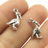 WYSIWYG 20pcs Charms Seagull Pelican Stock Bird 18x9mm Tibetan Silver Color Antique Jewelry Making DIY Handmade Craft Pendant