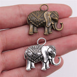 2 colgantes de elefante de doble cara de bronce antiguo de color plata antigua de 28 x 31 mm, ef4383