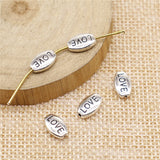 WYSIWYG 40pcs 10x6mm Antique Silver Color Love Spacer Beads Love European Small Hole Spacer Beads Love Small Beads